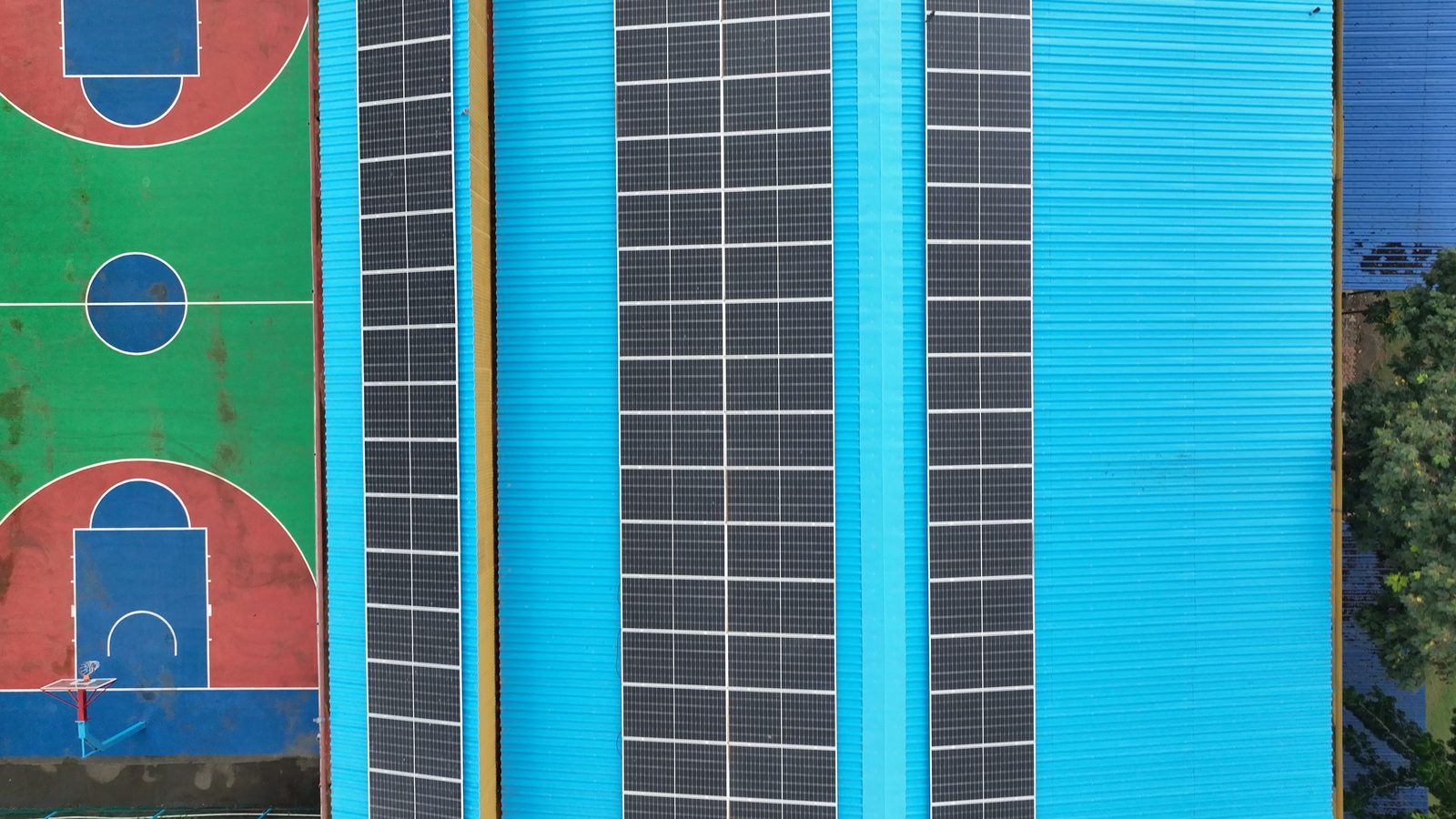 Close-up view of Fatima High School Vidyavihar solar panels above basketball court